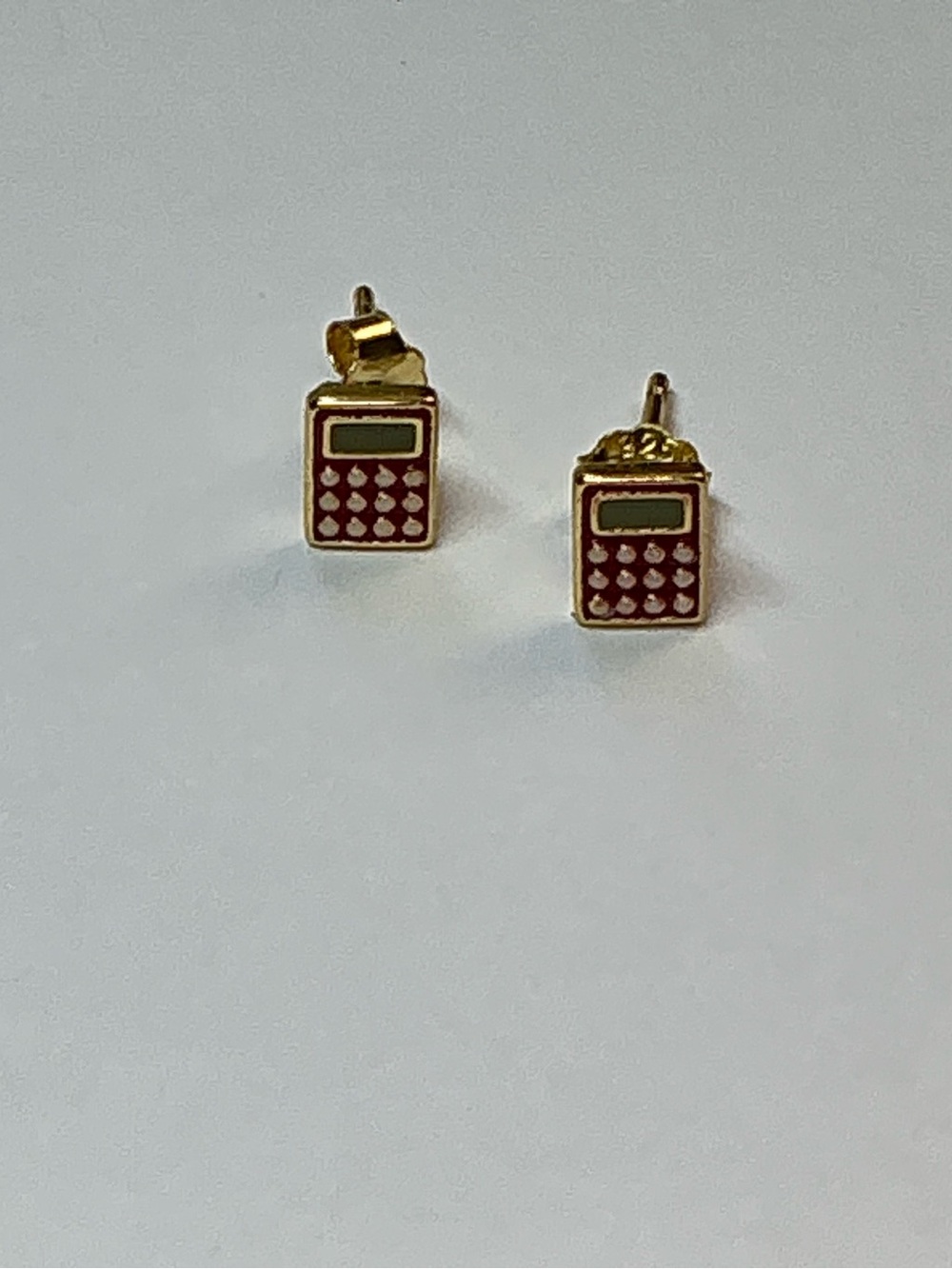 Sterling silver gold tone calculator stud earrings